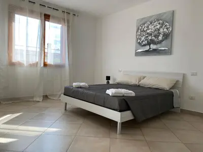 Letto o letti in una camera di CASA VACANZA MARYAM