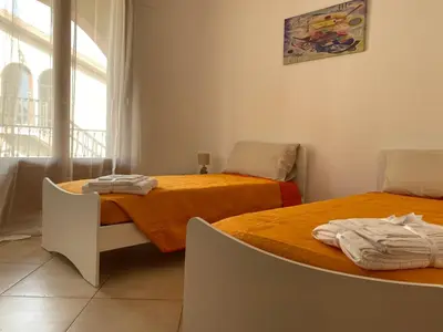 Letto o letti in una camera di CASA VACANZA MARYAM