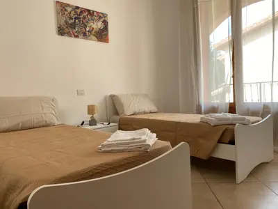 Letto o letti in una camera di CASA VACANZA MARYAM