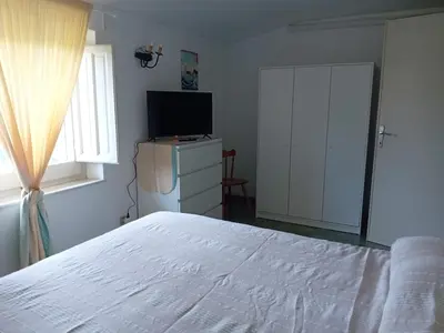 Letto o letti in una camera di Villa Gialla - Il mare a due passi
