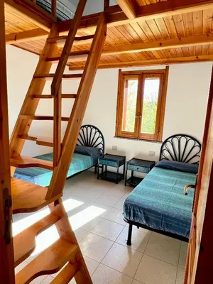 Letto o letti in una camera di Casa Giada Costa Rei