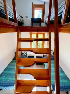 Letto o letti a castello in una camera di Casa Giada Costa Rei