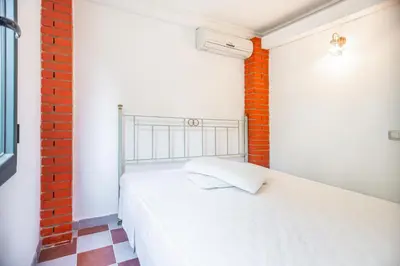 Letto o letti in una camera di Villino Pinewood Sardinia