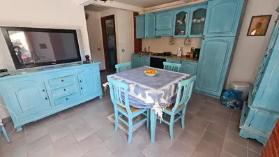 Cucina o angolo cottura di Villino Pinewood Sardinia