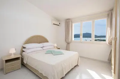 Letto o letti in una camera di Villa Sara
