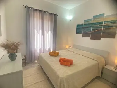 Letto o letti in una camera di Il bacio del sole