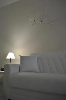 Letto o letti in una camera di Casa del Bottone Room〔Marina〕