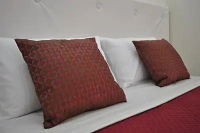 Letto o letti in una camera di Casa del Bottone Room〔Marina〕