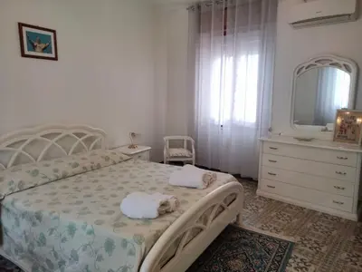 Letto o letti in una camera di Fabia's House