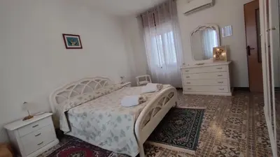 Letto o letti in una camera di Fabia's House