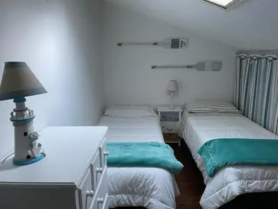Letto o letti in una camera di Santa Margherita di Pula, Calaverde, Deliziosa villetta 100 metri dal mare