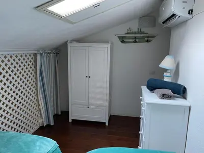 Letto o letti in una camera di Santa Margherita di Pula, Calaverde, Deliziosa villetta 100 metri dal mare