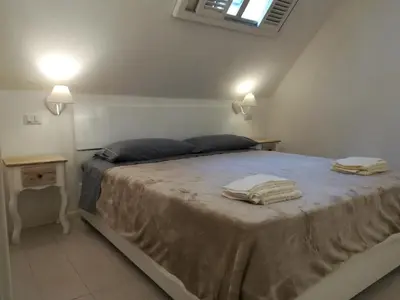 Letto o letti in una camera di Santa Margherita di Pula, Calaverde, Deliziosa villetta 100 metri dal mare