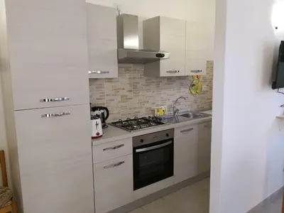 Cucina o angolo cottura di Appartamenti Brezza di Mare