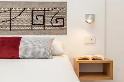 Letto o letti in una camera di Domu Qirat - Authentic Rooms with Private Terraces