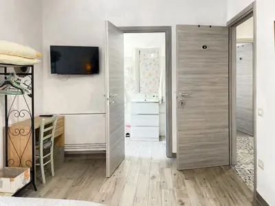 TV o dispositivi per l'intrattenimento presso Affittacamere DOMO AGORA'