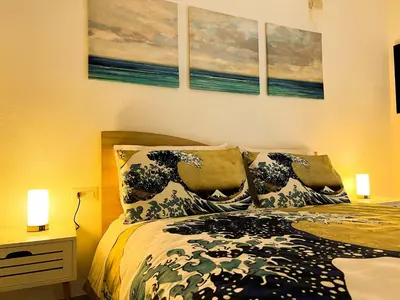 Letto o letti in una camera di Sunnyside Apartment