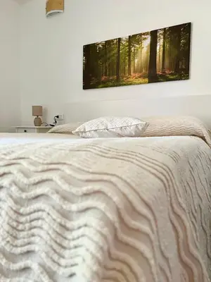 Letto o letti in una camera di Tra Terra e Mare
