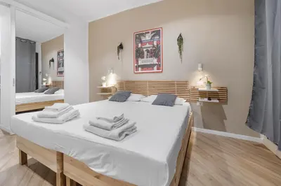 Letto o letti in una camera di Domus Karalis II