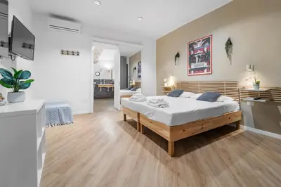 Letto o letti in una camera di Domus Karalis II