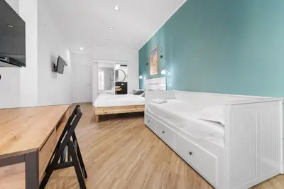 Letto o letti in una camera di Domus Karalis II
