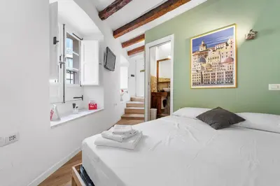 Letto o letti in una camera di Domus Karalis II