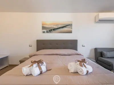 Letto o letti in una camera di Villa Monica - Suites