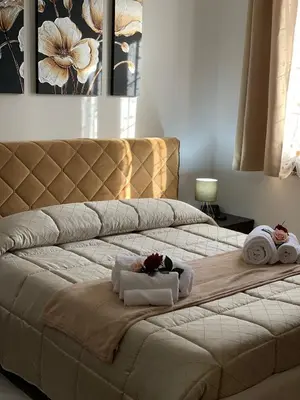 Letto o letti in una camera di La Petite Maison