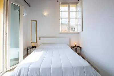 Letto o letti in una camera di Penthouse with Terrace in historic centre