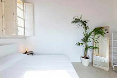 Letto o letti in una camera di Penthouse with Terrace in historic centre