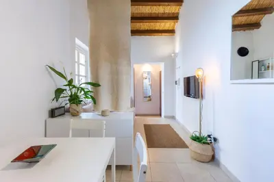 TV o dispositivi per l'intrattenimento presso Penthouse with Terrace in historic centre