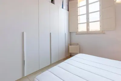Letto o letti in una camera di Penthouse with Terrace in historic centre