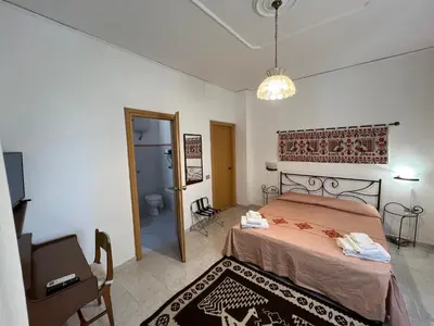 Letto o letti in una camera di Su Marmuri