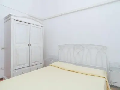 Letto o letti in una camera di Holiday Home Villa Monte Nai - REI420 by Interhome