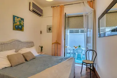 Letto o letti in una camera di IzzHome Delightful
