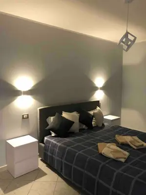 Letto o letti in una camera di LE STELLE DI SAN LORENZO appartamento indipendente