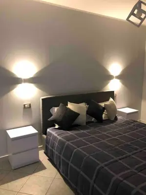 Letto o letti in una camera di LE STELLE DI SAN LORENZO appartamento indipendente