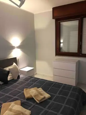 Letto o letti in una camera di LE STELLE DI SAN LORENZO appartamento indipendente