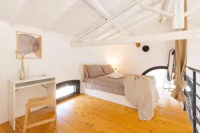 Letto o letti in una camera di Casa Rifa