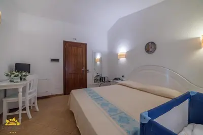 Letto o letti in una camera di Hotel Garden Beach