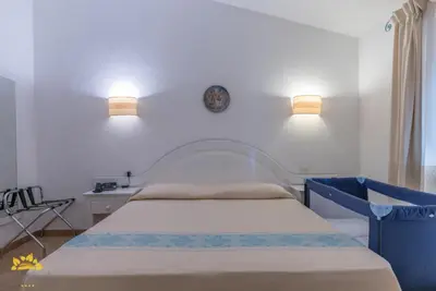 Letto o letti in una camera di Hotel Garden Beach