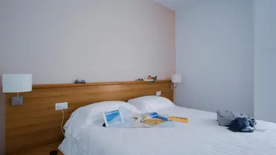 Letto o letti in una camera di Mistral2 Hotel