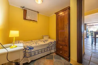 Letto o letti in una camera di Villa Allegra PANORAMICA 150 mt dal mare