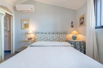 Letto o letti in una camera di Villa Allegra PANORAMICA 150 mt dal mare