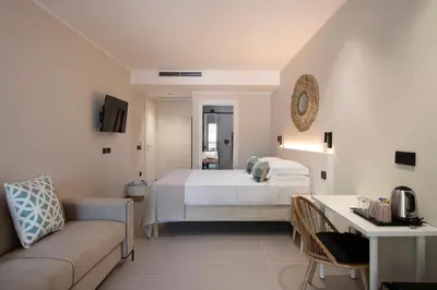 Letto o letti in una camera di MEM Lodge and Suite