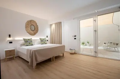 Letto o letti in una camera di MEM Lodge and Suite
