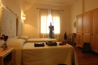 Letto o letti in una camera di Omu Axiu