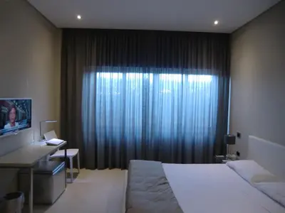 Letto o letti in una camera di B&Beach Cagliari guest house