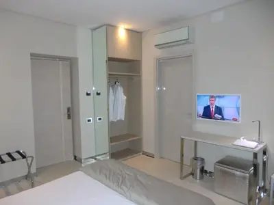 TV o dispositivi per l'intrattenimento presso B&Beach Cagliari guest house