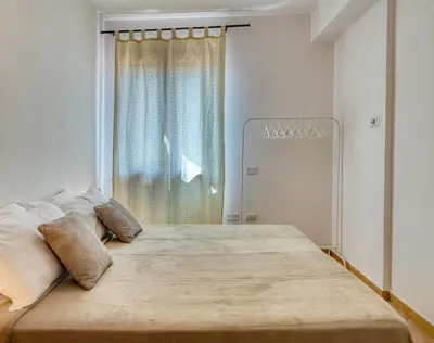 Letto o letti in una camera di IzzHome Everyway